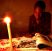Zimbabwean student Tawanda Moyo 15 years of Seke 2 Secondary School, in Harare doing his home work  at home using  candle light due to shortage of electricity which the country is facing.Zimbabwe now has the highest inflation rate in the world of 4000%