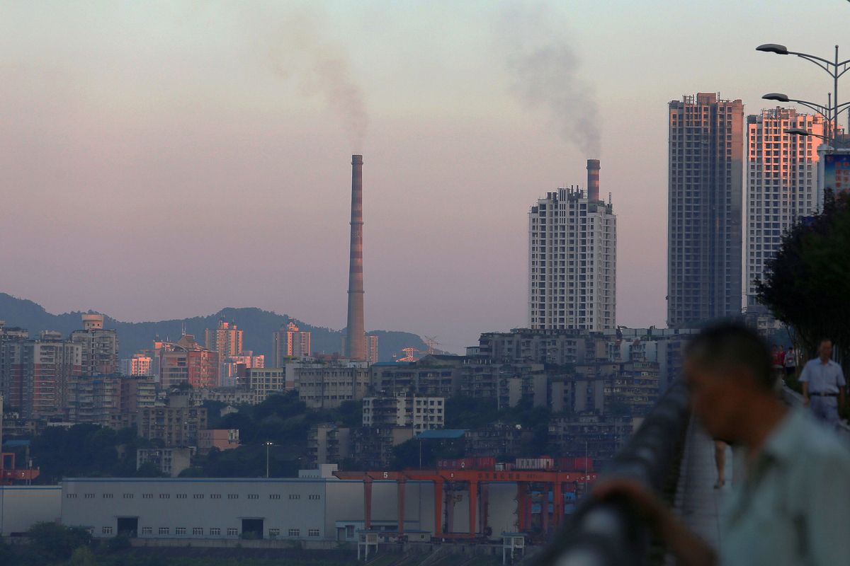 Rinnovabili • cina-emissioni-co2-maschera-crescita